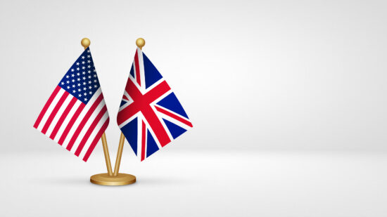 USA vs UK United Kingdom desk flags mockup 3d illustration. Versus flag of US United States of America