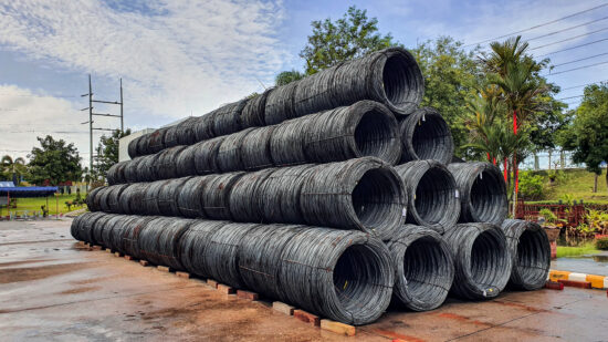 Stacked of high carbon wire rod for heavy industry production,Pile of metal steel wire roll for construction site, concrete usage and building construction